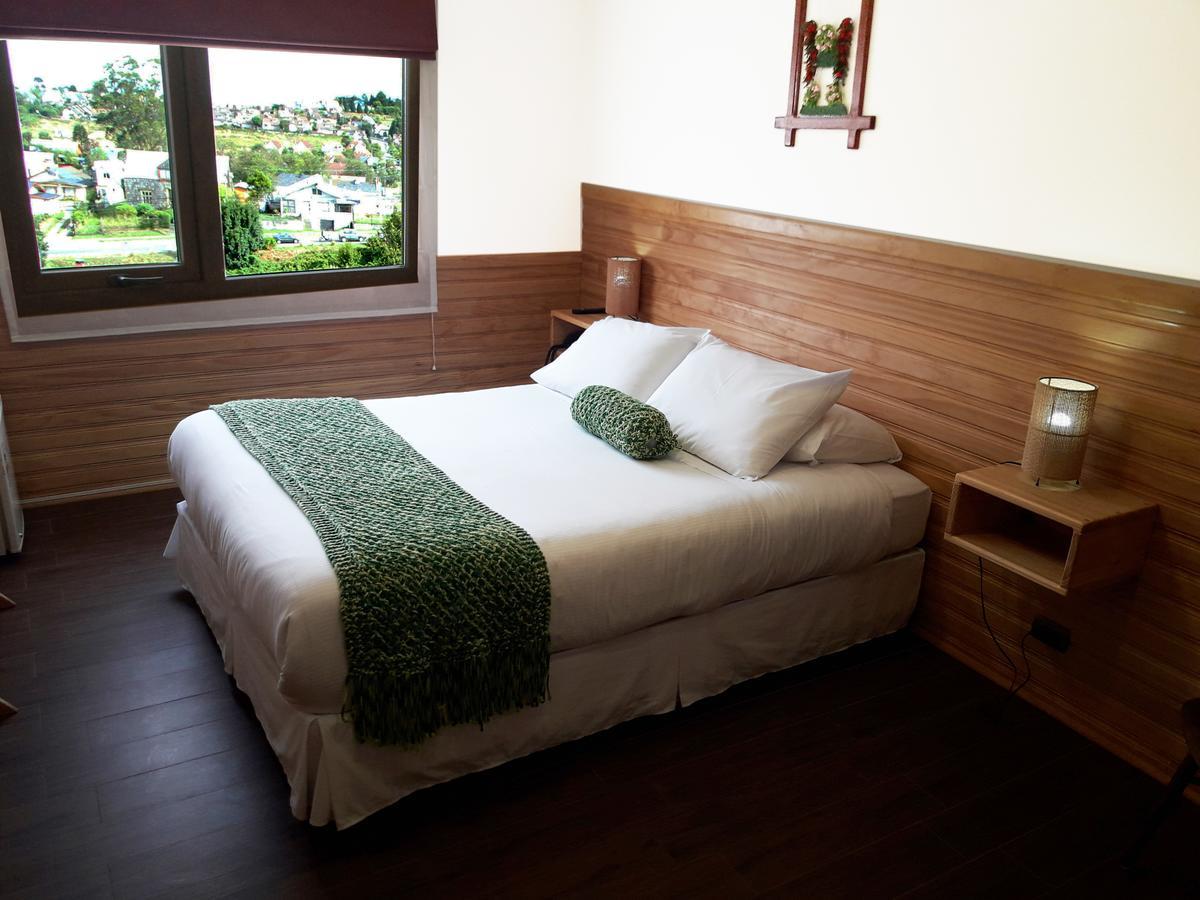 Dein Haus Hotel Y Departamentos Puerto Varas Bagian luar foto