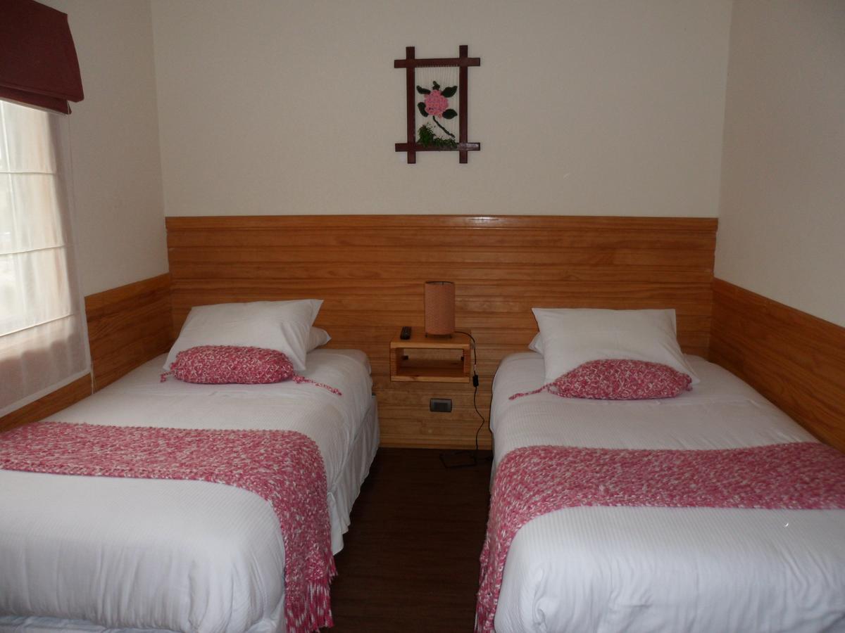 Dein Haus Hotel Y Departamentos Puerto Varas Bagian luar foto