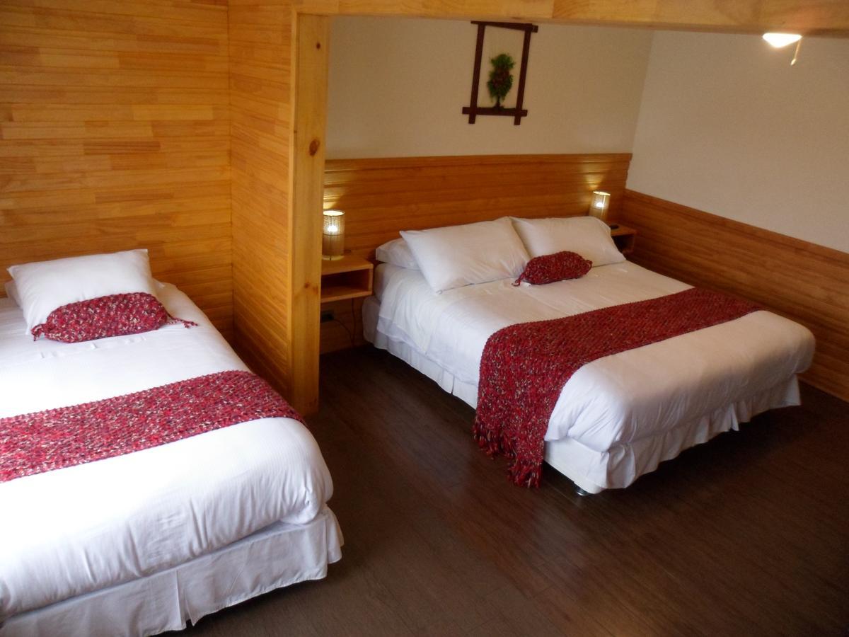 Dein Haus Hotel Y Departamentos Puerto Varas Bagian luar foto